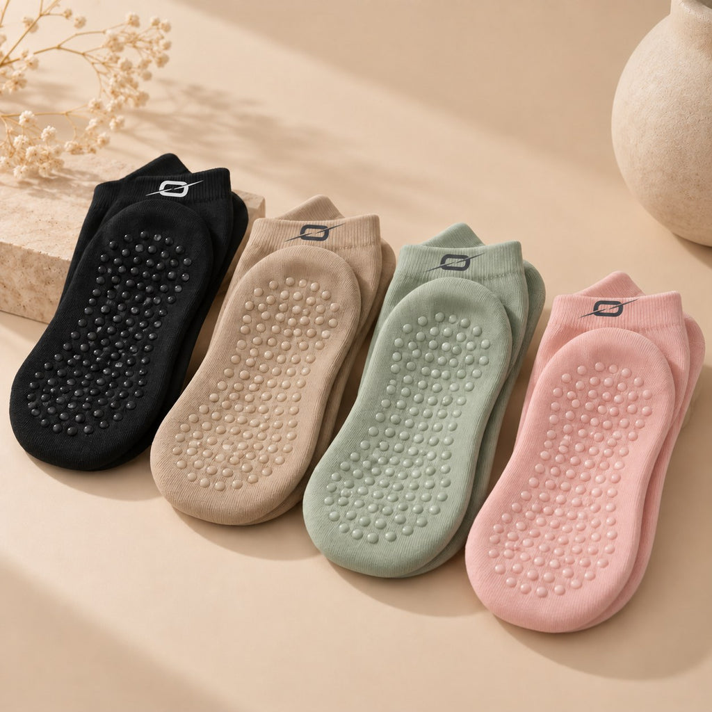 ORION Pilates Grip Socks in zwart, zand, mint en roze met het ORION-icoon