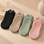 ORION Pilates Grip Socks in zwart, zand, mint en roze met het ORION-icoon